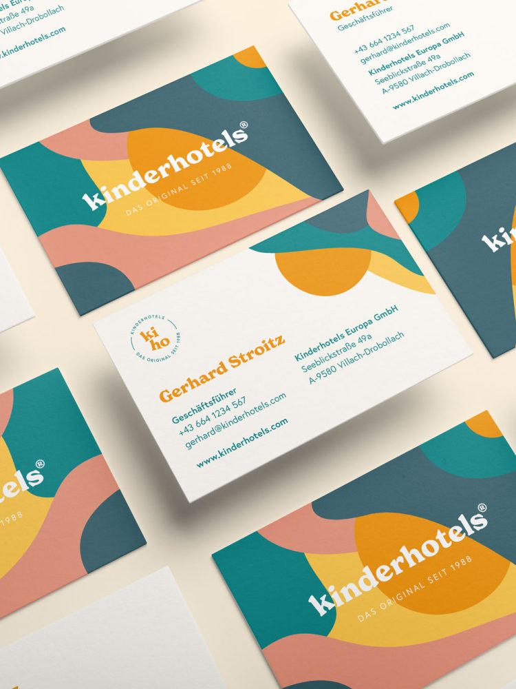 A set of business cards with different shapes and colors designed in Graz.