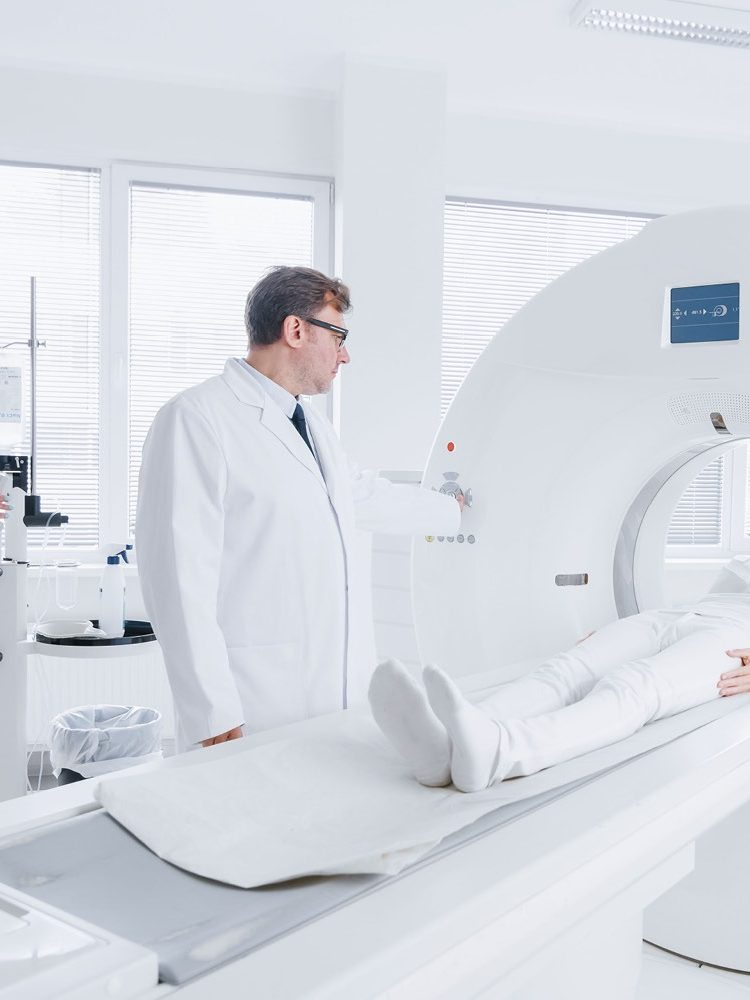 An MRI machine in a medical room, equipped with IASON technology.