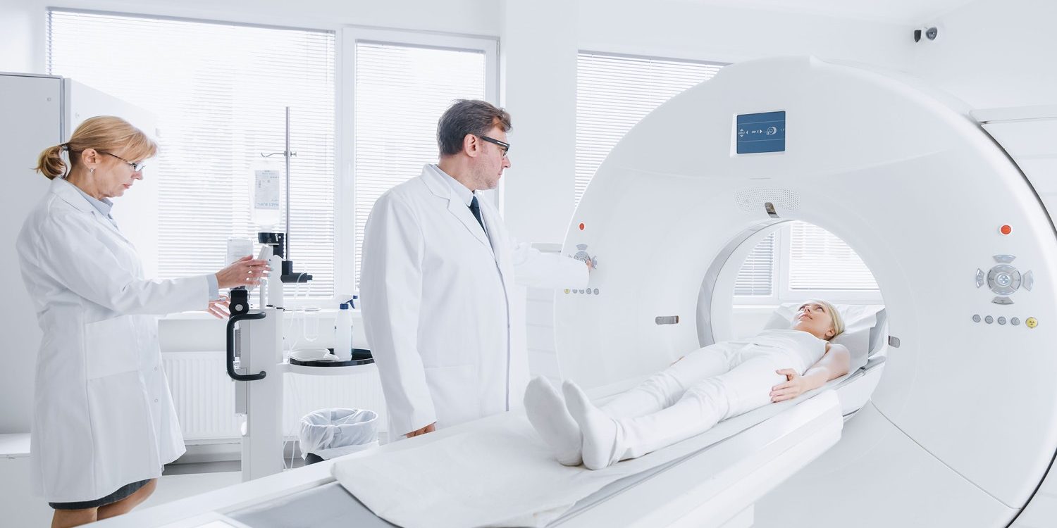 An MRI machine in a medical room, equipped with IASON technology.